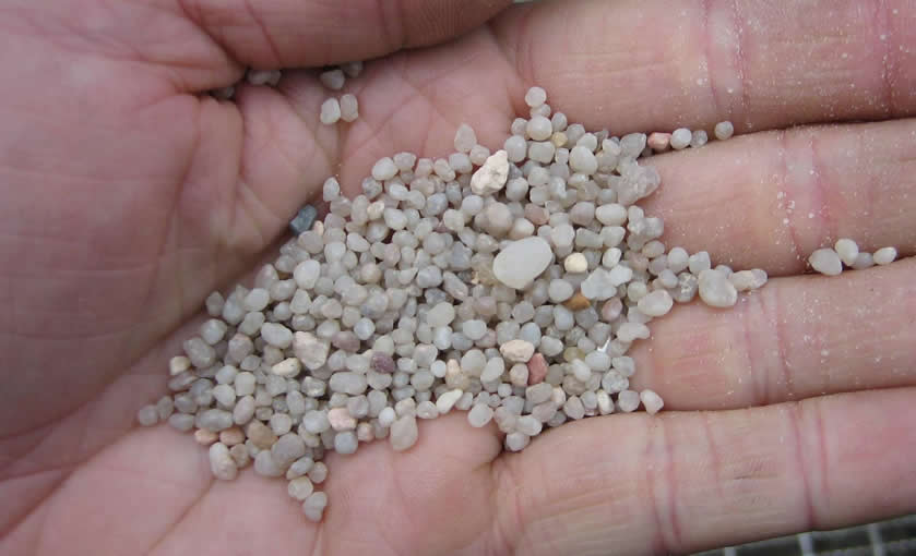 Sand pack material for Hayward well screen